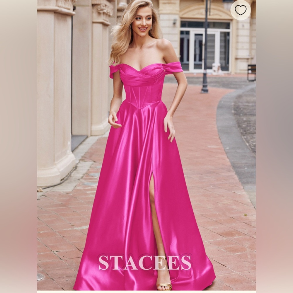 New never worn (labels attached) prom/bridesmaid dress. Beautiful fuchsia color